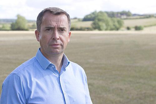 Calum Miller MP at possible development site
