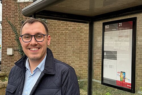 Tom Gordon stood at a bus stop in Harrogate and Knaresborough