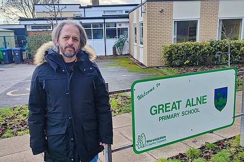 Cllr James Norris outside Great Alne school